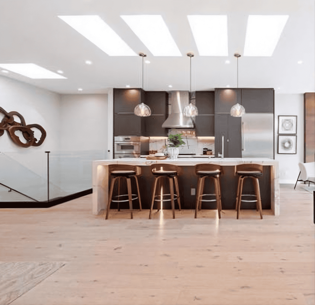 Saratoga kitchen remodel with marble island seating and stainless appliances by California Bay Builders