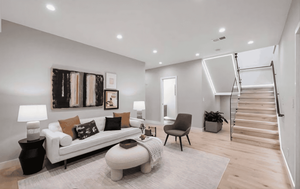 Modern living room with staircase.
