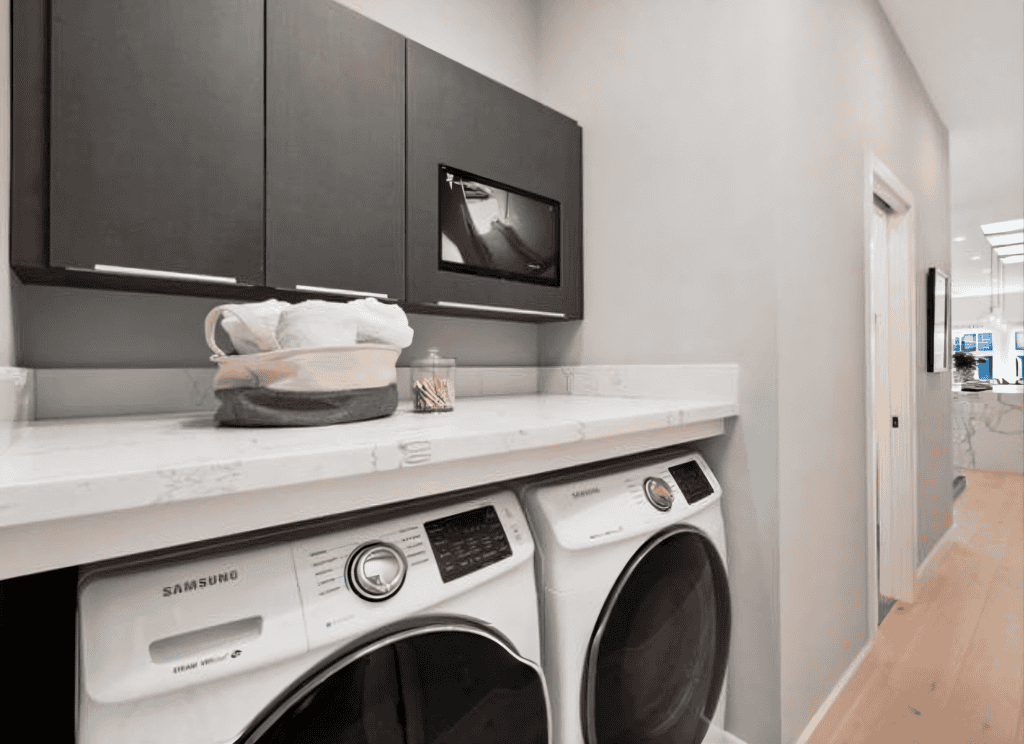Modern laundry room in Saratoga whole home renovation by California Bay Builders