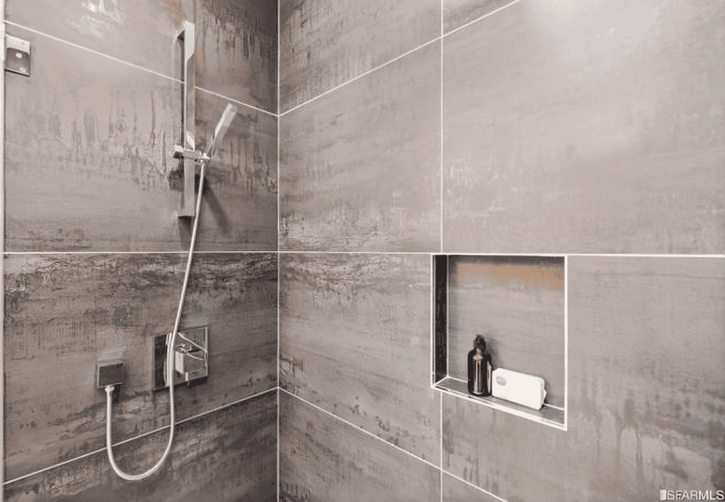 Modern shower with sleek tile design By California bay builders & Remodeling